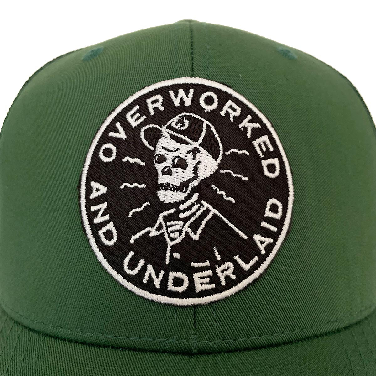 Overworked and Underlaid Trucker Hat